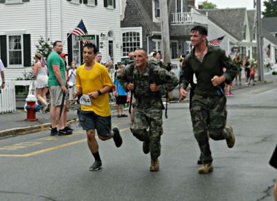 Mattapoisett Road Race
The 44th running of the Mattapoisett Road Race, July 4, 2014. Photo by Renae Reints
