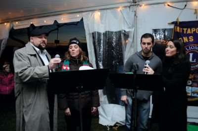Mattapoisett Tree Lighting
Mattapoisett lit one of the biggest trees Shipyard Park has ever seen at the 2011 Holiday in the Park. There was food from local establishments, ornament making, merry music and Santa! The moment was enough to spur two romantic marriage proposals. Organizers reported that over a thousand people attended the tree lighting, making it the biggest Holiday in the Park ever. Photo by Anne Kakley.
