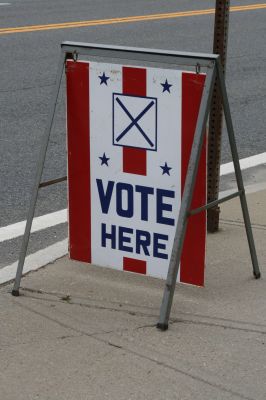 Vote Here
The only contested races in the Annual Mattapoisett Town Election on May 18, 2010 were for Library Trustee and Constable. The rest of the ballot contained incumbents seeking re-election, and two questions: one to make low income and some senior residents exempt from a Community Preservation Act surcharge, and another asking town residents whether or not they wanted to continue using public funds to remove snow and ice from private ways. Photo by Anne O'Brien-Kakley.
