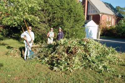 Mattapoisett Woman's Club 
On September 28, the garden group of the Mattapoisett Woman's Club brought shovels, clippers, trowels, and rakes to the badly overgrown butterfly garden at Center School and cleared out the overgrowth and weeds. The garden will be dedicated to Suzanne Sylvester who along with two other teachers designed, planted, and used this garden to teach students about butterflies. Suzanne was a member of the Mattapoisett Woman's Club and garden group, and this endeavor is in memory of her. Photo courtesy Karen Gardner
