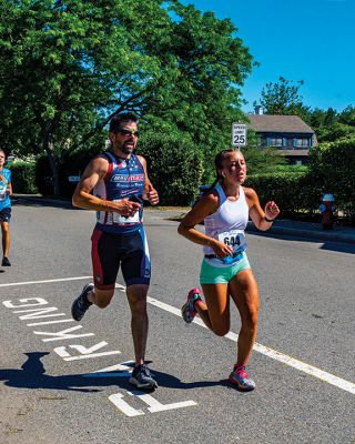 Mattapoisett Road Race 
The 50th running of the Mattapoisett 5 Mile Road Race took place on July 4. Margot Appleton and Trevor Wysong were the respective female and male winners. Photos by Ryan Feeney
