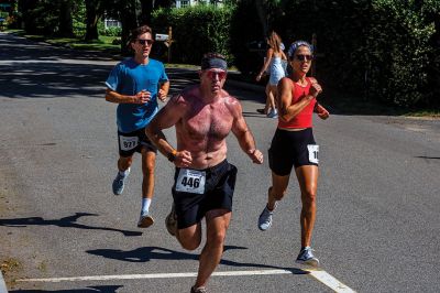 Mattapoisett Road Race 
The 50th running of the Mattapoisett 5 Mile Road Race took place on July 4. Margot Appleton and Trevor Wysong were the respective female and male winners. Photos by Ryan Feeney
