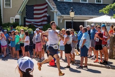 Mattapoisett Road Race 
The 50th running of the Mattapoisett 5 Mile Road Race took place on July 4. Margot Appleton and Trevor Wysong were the respective female and male winners. Photos by Ryan Feeney
