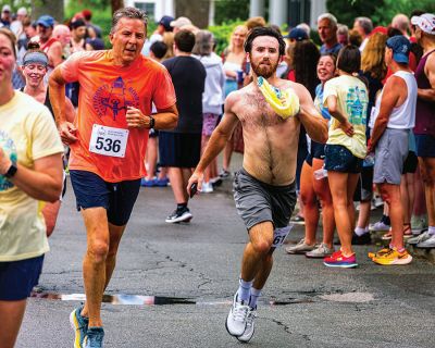 Mattapoisett Road Race
A humid atmosphere challenged the competitors, but the Mattapoisett Road Race was nonetheless conquered by over 1,000 runners. Photos by Ryan Feeney
