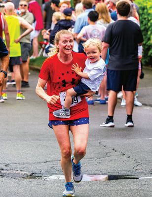 Mattapoisett Road Race
A humid atmosphere challenged the competitors, but the Mattapoisett Road Race was nonetheless conquered by over 1,000 runners. Photos by Ryan Feeney
