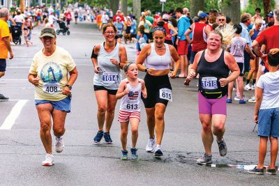 Mattapoisett Road Race
A humid atmosphere challenged the competitors, but the Mattapoisett Road Race was nonetheless conquered by over 1,000 runners. Photos by Ryan Feeney
