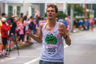 Mattapoisett Road Race
A humid atmosphere challenged the competitors, but the Mattapoisett Road Race was nonetheless conquered by over 1,000 runners. Photos by Ryan Feeney
