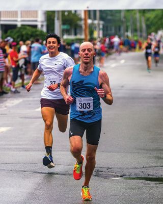 Mattapoisett Road Race
A humid atmosphere challenged the competitors, but the Mattapoisett Road Race was nonetheless conquered by over 1,000 runners. Photos by Ryan Feeney
