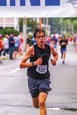 Mattapoisett Road Race
A humid atmosphere challenged the competitors, but the Mattapoisett Road Race was nonetheless conquered by over 1,000 runners. Photos by Ryan Feeney
