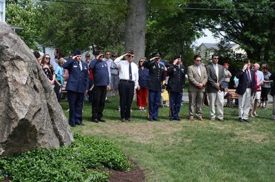 Memorial Day in Mattapoisett
Memorial Day in Mattapoisett was observed as it traditionally is, with ceremonies in front of the Mattapoisett Library followed by the parade march to Cushing Cemetery. This year’s guest speaker, Mattapoisett resident U.S. Army Sergeant Edward Sweeney, Jr. stirred the emotions of those in attendance with his speech about sacrifice and the American way of life. The Old Hammondtown School Band was impressive with its performance of several patriotic songs, and Representative William Straus, the selectmen, and
