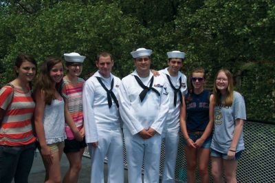 Memorial Day in NYC
Mattapoisett Girl Scout Troop 80689 spent Memorial Day weekend touring NYC. All the usual (and unusual) sights were seen. One of the girls asked if they could approach some soldiers and thank them for their service.  They did it more than once, and these Navy men were kind enough to pose with them for a photo.(Pictured l to r. . . Shannon Lynch, Mattapoisett - Tessa Camboia, Rochester - Jordan Costa, Fairhaven - Catherine Ball and Aimee Hill of Mattapoisett. Photo by Maria Lynch
