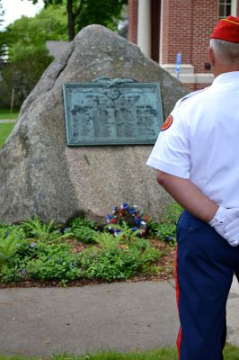 Memorial Day 2014
Scores of Mattapoisett residents gathered in front of the Mattapoisett Free Library the drizzly afternoon of May 26 to pay homage to veteran Americans who lost their lives. Onlookers filled the lawn and spilled out into the street to watch the Memorial Day ceremony with special guest speaker Navy Reserve Commander Paul J. Brawley who served more than 22 years of active duty and reserve service. After the ceremony, participants paraded through the town to the town wharf. Photo By Jean Perry
