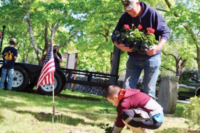 Memorial Day
Marion volunteers planted flowers at veterans’ gravesites ahead of Memorial Day. Photos by Robert Pina
