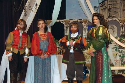 Merchant of Venice
The players in the Rochester Memorial Schools April 30, 2010 production of Merchant of Venice celebrate a happy ending for all the newlyweds. Left to right: Kyle Rood as Bassanio, Samantha Babineau as Nerrissa, Robert Johnson as Gratiano and Sara LaFrance as Portia. Photo courtesy of Kerry Bulman.
