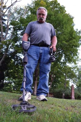 Relics Plus Metal Detecting Services
Tom Smith of Relics Plus Metal Detecting Services uses his metal detector to find bits and pieces of history in Rochester. Photo by Jean Perry
