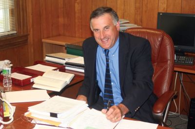 First Day
Michael Gagne on his first day as the new Mattapoisett town administrator. Mr. Gagne started on August 31, after a screening committee narrowed down the town administrator search to Mr. Gagne and Mark Andrews of Lawrence, Ma. Mr. Gagne's experience as a town administrator in Dartmouth for over 20 years helped him get the job as the new Mattapoisett town administrator. Chairman Collyer described Mr. Gagne as ready to "hit the ground running". Photo by Anne OBrien-Kakley
