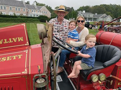 Antique Car Show
Mike Esposito and his family at his annual antique car show at Silver Gull. Photo courtesy Bertram Zarins
