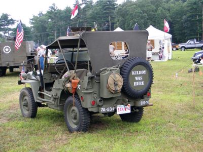 Rochester Country Fair
One of 26th Infantry Division Yankee Divisions World War II military vehicles that was on display at the Rochester Country Fair. The Infantry Division is a group of re-enactors that tours parades and fairs throughout the northeast. Above right: Young members of the 26th Infantry Division Yankee Division saluting a higher ranking official. Photos by Adam Silva.
