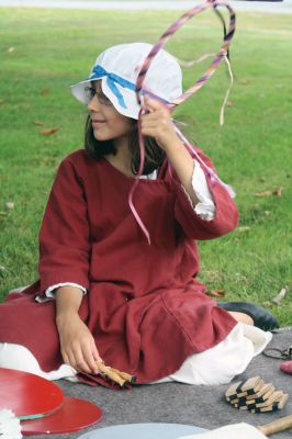 Heritage Days 2011
Emily Richard, playing the part of Sara Spooner, was one of the children who dressed in period costume demonstrating 18th century living for Mattapoisett's Heritage Days on August 6, 2011. Photo by Felix Perez.
