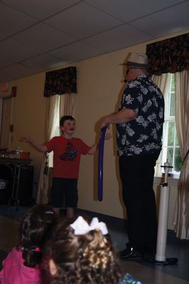 Minecraft Magician 
It was all about “Building a Better World” on August 14 during a children’s performance sponsored by the Plumb Library and the Rochester Cultural Council. Performer “Jungle Jim” Manning merged Minecraft with magic and built a blast of a time with the kids. Photos by Jean Perry
