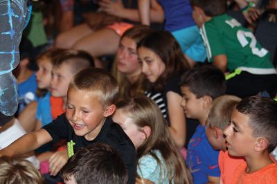 Minecraft Magician 
It was all about “Building a Better World” on August 14 during a children’s performance sponsored by the Plumb Library and the Rochester Cultural Council. Performer “Jungle Jim” Manning merged Minecraft with magic and built a blast of a time with the kids. Photos by Jean Perry
