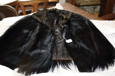 Monkey Cape
Mattapoisett Historical Society Museum Curator Elizabeth Hutchison and some volunteers came across some strange items while cataloguing the museum’s collection, including three monkey fur capes. Their initial reaction? “I’m not touching that…!”Photos by Jean Perry
