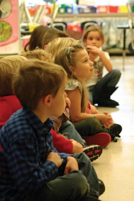 Mother Goose
The children of Ms. Boudreau's kindergarten class were among the Center School students who enjoyed a visit from Mother Goose (Anne-Marie Forer) on the morning of December 9, 2011. The event was arranged by the Mattapoisett PTA, Arts and Humanities Committee. Photo by Anne Kakley.
