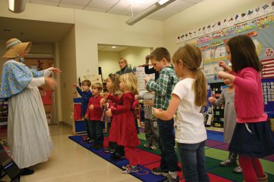 Mother Goose
The children of Ms. Boudreau's kindergarten class were among the Center School students who enjoyed a visit from Mother Goose (Anne-Marie Forer) on the morning of December 9, 2011. The event was arranged by the Mattapoisett PTA, Arts and Humanities Committee. Photo by Anne Kakley.
