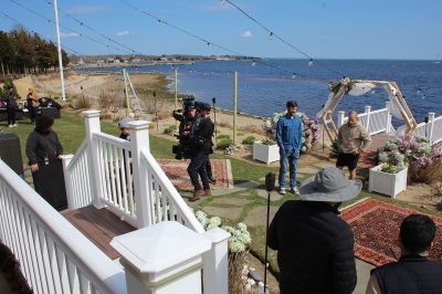 The Weekend on Cape Cod When Everything Changed
A positive vibe permeates the movie set of “The Weekend on Cape Cod When Everything Changed,” which is being filmed in Mattapoisett this month. Working long hours, the do-it-all staff improvises daily to provide support and supply nourishment for actors and crew. The story follows an Iranian immigrant who marries her billionaire boss's son to maintain her American visa, but the green-card arrangement encounters unexpected challenge when the bride’s besties bring boyfriends with their cross-cultural baggage.
