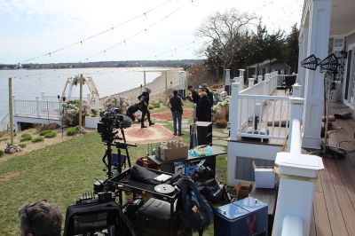 The Weekend on Cape Cod When Everything Changed
A positive vibe permeates the movie set of “The Weekend on Cape Cod When Everything Changed,” which is being filmed in Mattapoisett this month. Working long hours, the do-it-all staff improvises daily to provide support and supply nourishment for actors and crew. The story follows an Iranian immigrant who marries her billionaire boss's son to maintain her American visa, but the green-card arrangement encounters unexpected challenge when the bride’s besties bring boyfriends with their cross-cultural baggage.
