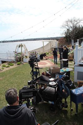 The Weekend on Cape Cod When Everything Changed
A positive vibe permeates the movie set of “The Weekend on Cape Cod When Everything Changed,” which is being filmed in Mattapoisett this month. Working long hours, the do-it-all staff improvises daily to provide support and supply nourishment for actors and crew. The story follows an Iranian immigrant who marries her billionaire boss's son to maintain her American visa, but the green-card arrangement encounters unexpected challenge when the bride’s besties bring boyfriends with their cross-cultural baggage.
