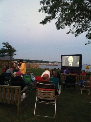 Lions Movie Night
The Mattapoisett Lions Club hosted the first in a series of outdoor movie nights at Shipyard Park. A good-sized crowd comprised of people of all ages, the young and the young at heart, gathered in a variety of seating arrangements to enjoy an open-air viewing of Back to the Future. Photos by Marilou Newell
