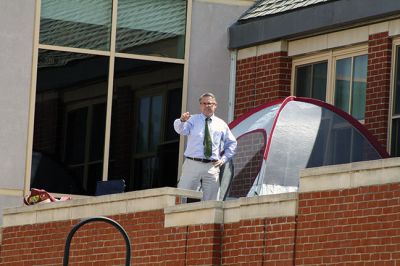 Mr. T!
Students chanted “Mr. T!” to Mr. Tavares on the roof as they left school June 18. Kevin Tavares, associate principal, challenged the kids to raise 481 canned goods to top Mr. T’s 480 – they collected over 800 instead! Mr. T had to spend the night on the roof of Center School, calling the community out to visit him and bring canned goods so he could match the students’ grand total. Photos by Jean Perry
