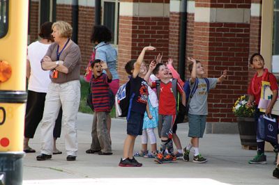 Mr. T!
Students chanted “Mr. T!” to Mr. Tavares on the roof as they left school June 18. Kevin Tavares, associate principal, challenged the kids to raise 481 canned goods to top Mr. T’s 480 – they collected over 800 instead! Mr. T had to spend the night on the roof of Center School, calling the community out to visit him and bring canned goods so he could match the students’ grand total. Photos by Jean Perry
