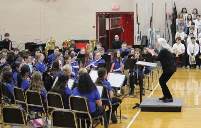 FORM
Hannah Moore, instrumental teacher at Sippican School, leads her student musicians in a performance at the FORM Choral Instrumental Concert held on March 18. Photo Courtesy Old Rochester Regional School District and MA Superintendency Union #55.
