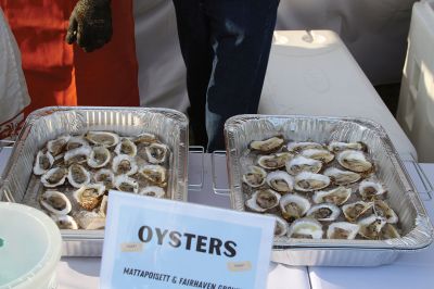 Community Picnic
The Mattapoisett Land Trust held its annual community picnic on August 3 at the Munro Preserve, complete with oyster service. Taking first place for best centerpiece was Table 29 with its Barbie theme. The Whale, at Table 1, was runner-up, and the Bird table (27) was third. Seth Asser and Gary Brown provided live music for the BYOB event. Photos by Mick Colageo
