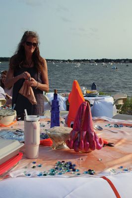 Community Picnic
The Mattapoisett Land Trust held its annual community picnic on August 3 at the Munro Preserve, complete with oyster service. Taking first place for best centerpiece was Table 29 with its Barbie theme. The Whale, at Table 1, was runner-up, and the Bird table (27) was third. Seth Asser and Gary Brown provided live music for the BYOB event. Photos by Mick Colageo
