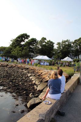 Community Picnic
The Mattapoisett Land Trust held its annual community picnic on August 3 at the Munro Preserve, complete with oyster service. Taking first place for best centerpiece was Table 29 with its Barbie theme. The Whale, at Table 1, was runner-up, and the Bird table (27) was third. Seth Asser and Gary Brown provided live music for the BYOB event. Photos by Mick Colageo
