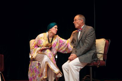 Murder with Wine
Jamie Alves (left) and Jay Gould (right) perform a scene as a psychic ghost-hunting medium and a senile old professor during the “Murder & Wine” fundraiser at Marion Music Hall on Friday, October 19.  Photo by Eric Tripoli.

