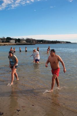 Mattapoisett Polar Plunge
New Year’s Day 2023 was bright and balmy when over 100 “plungers” ran, walked, hopped and slid into the freezing waters at Mattapoisett Town Beach. The event was hosted by an ad hoc group collecting donations for those battling cancer. The group has been successful in their efforts to help offset the unseen costs associated with a cancer diagnosis impacting local families. Heather Bichsel of the group said that this year they collected approximately $2,500, monies that will be given to a local family as wel
