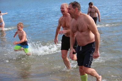 Mattapoisett Polar Plunge
New Year’s Day 2023 was bright and balmy when over 100 “plungers” ran, walked, hopped and slid into the freezing waters at Mattapoisett Town Beach. The event was hosted by an ad hoc group collecting donations for those battling cancer. The group has been successful in their efforts to help offset the unseen costs associated with a cancer diagnosis impacting local families. Heather Bichsel of the group said that this year they collected approximately $2,500, monies that will be given to a local family as wel
