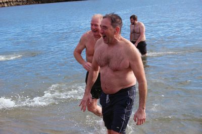 Mattapoisett Polar Plunge
New Year’s Day 2023 was bright and balmy when over 100 “plungers” ran, walked, hopped and slid into the freezing waters at Mattapoisett Town Beach. The event was hosted by an ad hoc group collecting donations for those battling cancer. The group has been successful in their efforts to help offset the unseen costs associated with a cancer diagnosis impacting local families. Heather Bichsel of the group said that this year they collected approximately $2,500, monies that will be given to a local family as wel
