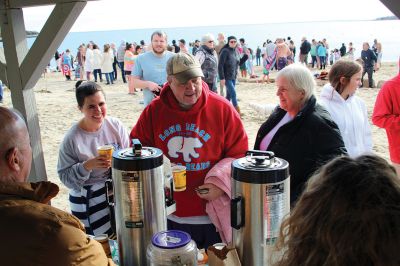 Mattapoisett Polar Plunge
New Year’s Day 2023 was bright and balmy when over 100 “plungers” ran, walked, hopped and slid into the freezing waters at Mattapoisett Town Beach. The event was hosted by an ad hoc group collecting donations for those battling cancer. The group has been successful in their efforts to help offset the unseen costs associated with a cancer diagnosis impacting local families. Heather Bichsel of the group said that this year they collected approximately $2,500, monies that will be given to a local family as wel
