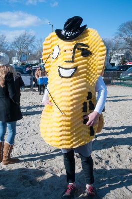 Freezin' for a Reason 2014
Participants in the 2014 Polar Plunge on January 1 were encouraged to wear costumes for the event, which raised thousands of dollars for the BAM Foundation. BAM is an organization that offers financial assistance to families battling cancer to help offset the unexpected costs of cancer treatment. Hundreds of people turned out for the event, with over a hundred participants who plunged into 34 degree waters, just a few degrees warmer than the 28 degree air temperature that morning.  Photo by Felix Perez
