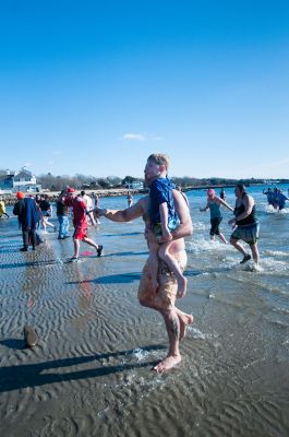 Freezin' for a Reason 2014
Participants in the 2014 Polar Plunge on January 1 were encouraged to wear costumes for the event, which raised thousands of dollars for the BAM Foundation. BAM is an organization that offers financial assistance to families battling cancer to help offset the unexpected costs of cancer treatment. Hundreds of people turned out for the event, with over a hundred participants who plunged into 34 degree waters, just a few degrees warmer than the 28 degree air temperature that morning.  Photo by Felix Perez
