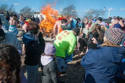 Freezin' for a Reason 2014
Participants in the 2014 Polar Plunge on January 1 were encouraged to wear costumes for the event, which raised thousands of dollars for the BAM Foundation. BAM is an organization that offers financial assistance to families battling cancer to help offset the unexpected costs of cancer treatment. Hundreds of people turned out for the event, with over a hundred participants who plunged into 34 degree waters, just a few degrees warmer than the 28 degree air temperature that morning.  Photo by Felix Perez
