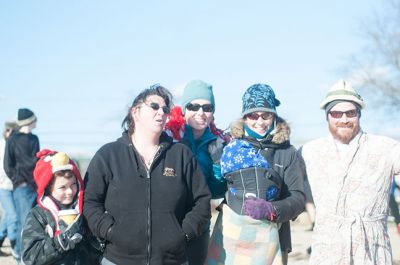 Freezin' for a Reason 2014
Participants in the 2014 Polar Plunge on January 1 were encouraged to wear costumes for the event, which raised thousands of dollars for the BAM Foundation. BAM is an organization that offers financial assistance to families battling cancer to help offset the unexpected costs of cancer treatment. Hundreds of people turned out for the event, with over a hundred participants who plunged into 34 degree waters, just a few degrees warmer than the 28 degree air temperature that morning.  Photo by Felix Perez
