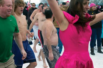 New Year Plunge
On January 1, 2013, Mattapoisett Town Beach played host to a New Year’s polar plunge fundraiser.  The event, which attracted over 400 people, raised money to benefit BAM Foundation, Inc., a New Bedford non-profit which donates money to South Coast families dealing with members who have cancer.  The Huggins family of Mattapoisett received such a donation while husband and father, William, was in treatment for cancer in his colon and liver.  Photo by Eric Tripoli
