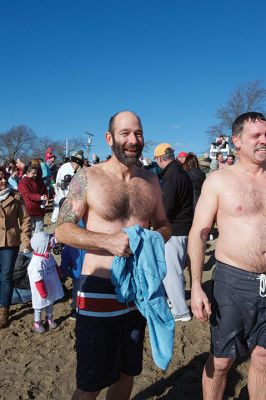 Freezin’ for a Reason Polar Plunge
It takes a certain type of person to jump into the cold ocean on New Year’s morning. Behold, the locals who fit that description as they enjoy a frosty January 1st at Mattapoisett Town Beach for the annual Freezin’ for a Reason Polar Plunge! Hundreds lined the beach to take the plunge, with bundled spectators watching from the sidelines and cheering as the plungers charged ahead screaming and shrieking with exhilaration. Proceeds from the plunge benefit locals battling cancer. Photos by Colin Veitch
