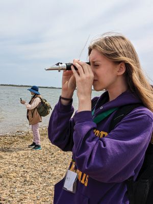 Nantucket Shellfish Hatchery
Old Rochester Regional junior Connie Friedman of Marion gets a look through a refractometer that measures salinity in water. The salt-measuring exercise was part of the many experiences that 31 Marine Biology students from ORR’s junior and sophomore classes got during Monday morning’s field trip with the Mattapoisett Land Trust to visit Nantucket’s Shellfish Hatchery and the UMass Boston Field Station. Photo courtesy of Lynn Connor
